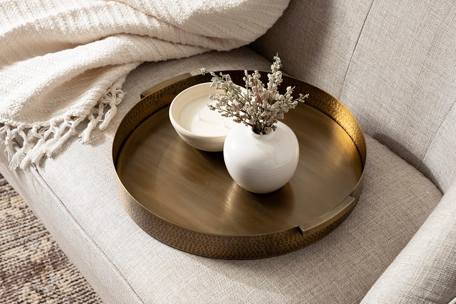 Kate and Laurel Samana Modern Glam Round Metal Tray; 17 Inch Diameter; Antique Brass; Circular Polished Decorative Tray with Hammered Surface and Minimalist Handles